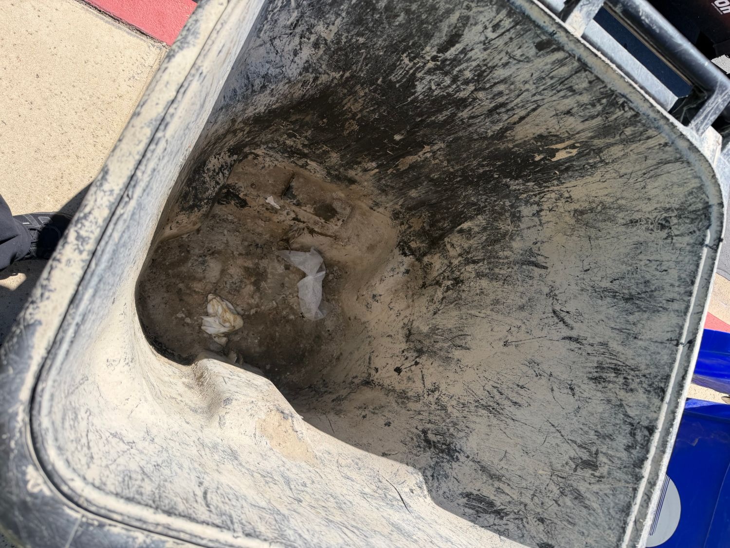 Before: dirty trash bin interior